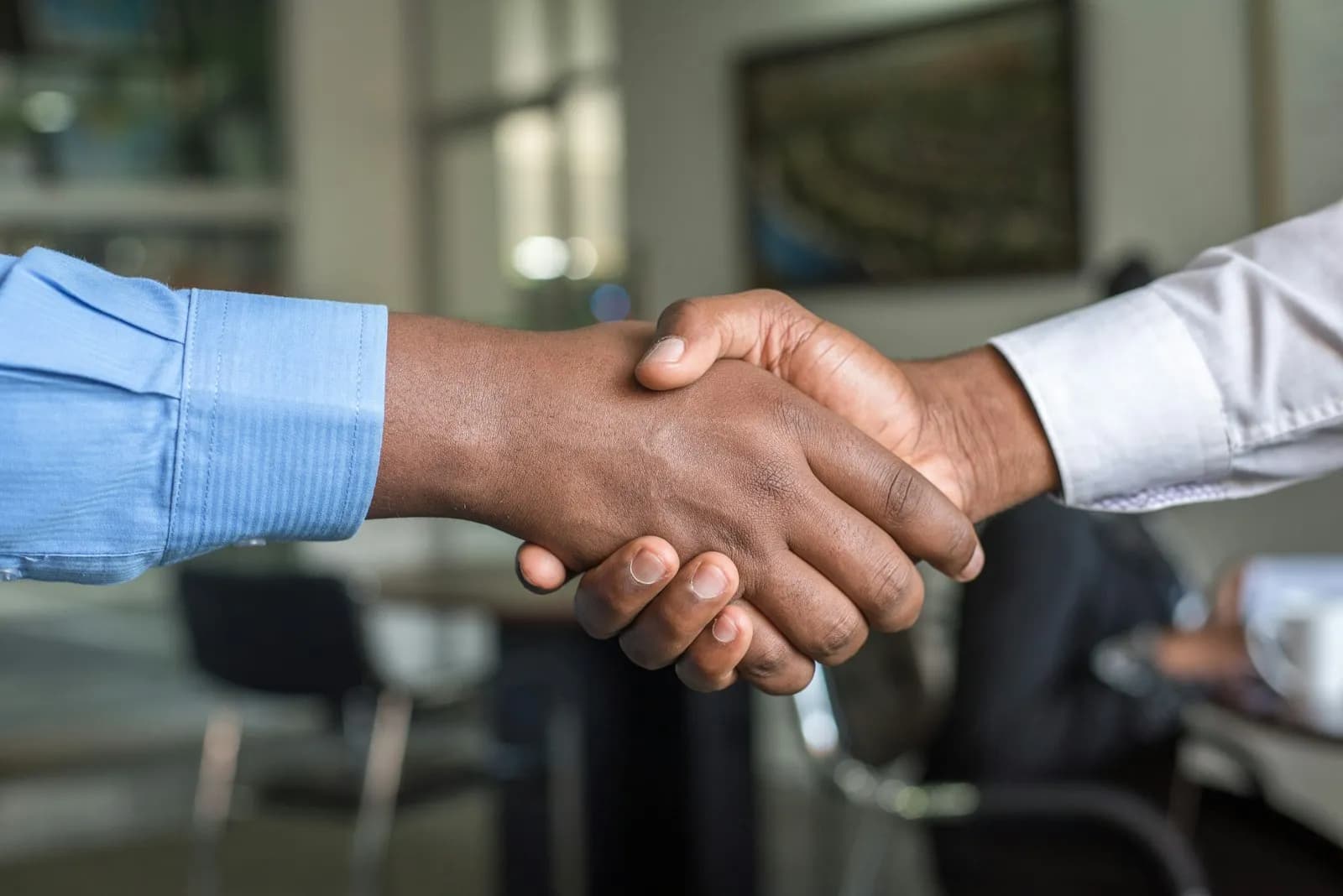 A handshake at the start of a new engagement